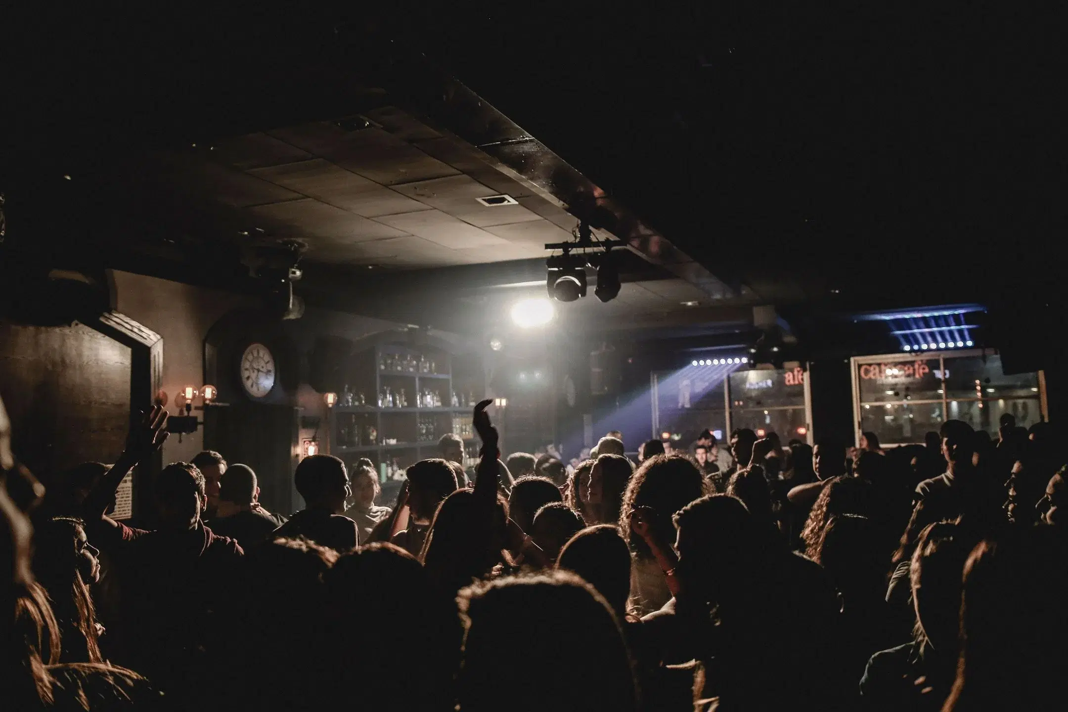 Crowd of guests at a bar